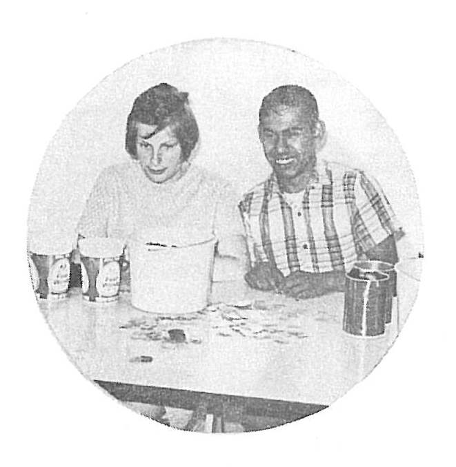 Two people at a table with beverages, black and white vintage photograph from Sandusky County Ohio